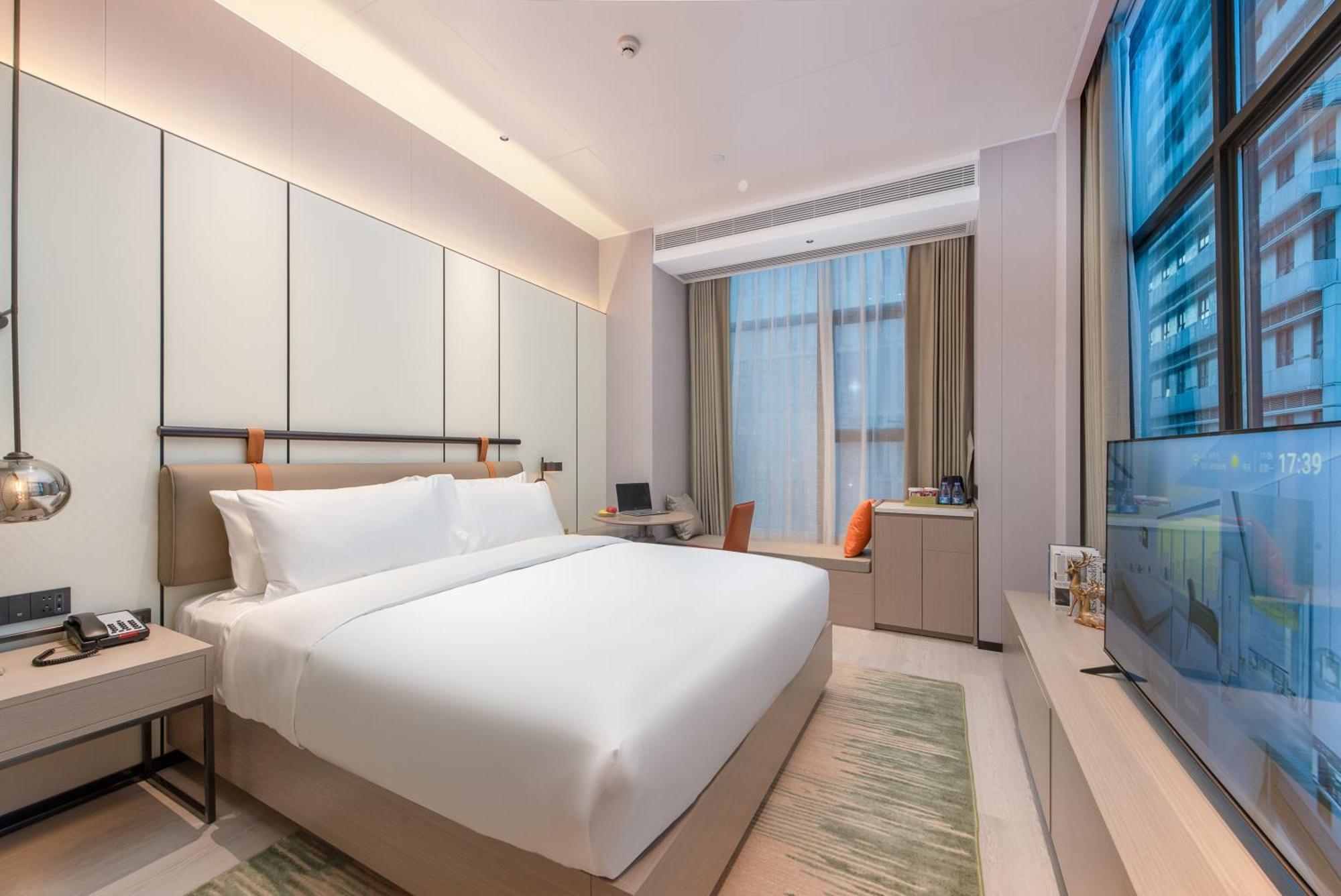 Oness Executive Hotel Guangzhou Huangpu Luogang - Free Shuttle Bus For Canton Fair กวางโจว ภายนอก รูปภาพ