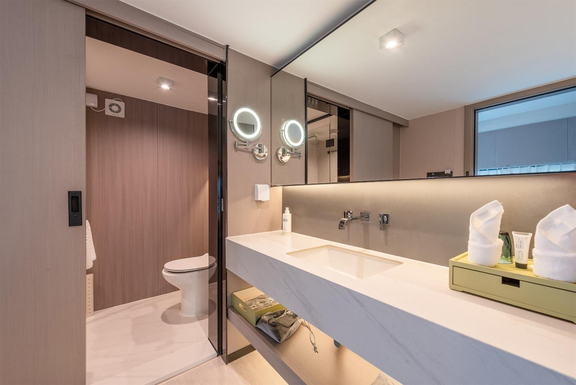 Oness Executive Hotel Guangzhou Huangpu Luogang - Free Shuttle Bus For Canton Fair กวางโจว ภายนอก รูปภาพ