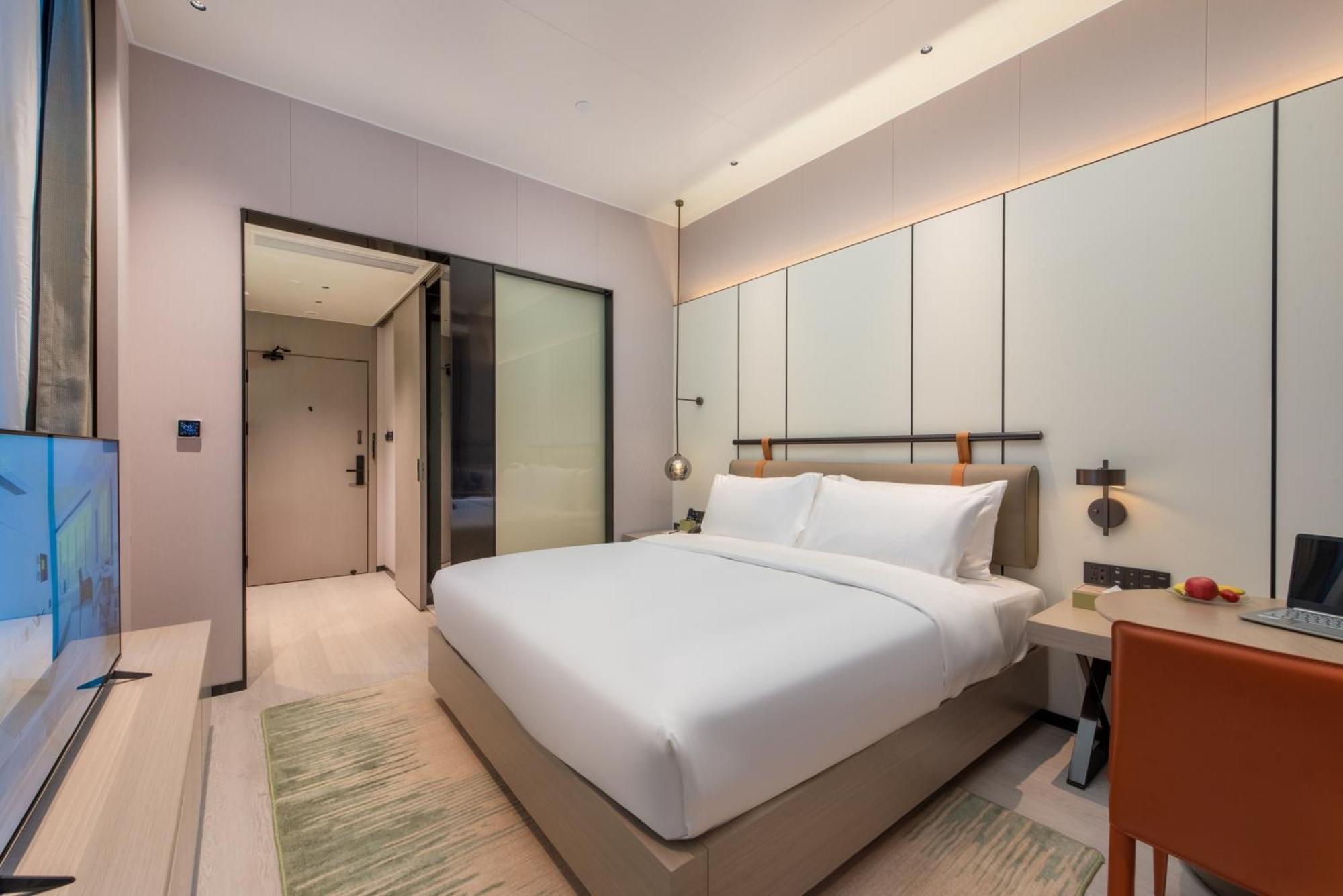 Oness Executive Hotel Guangzhou Huangpu Luogang - Free Shuttle Bus For Canton Fair กวางโจว ภายนอก รูปภาพ
